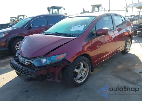 2010 Honda Insight Lx z USA, uszkodzony, nr VIN JHMZE2H51AS024865